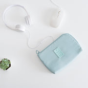 Portable charger in digital finishing bag, compact and stylish for easy charging on the go.
