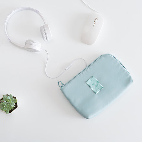 Portable charger in digital finishing bag, compact and stylish for easy charging on the go.
