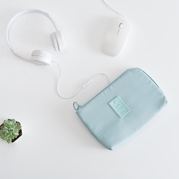 Portable charger in digital finishing bag, compact and stylish for easy charging on the go.
